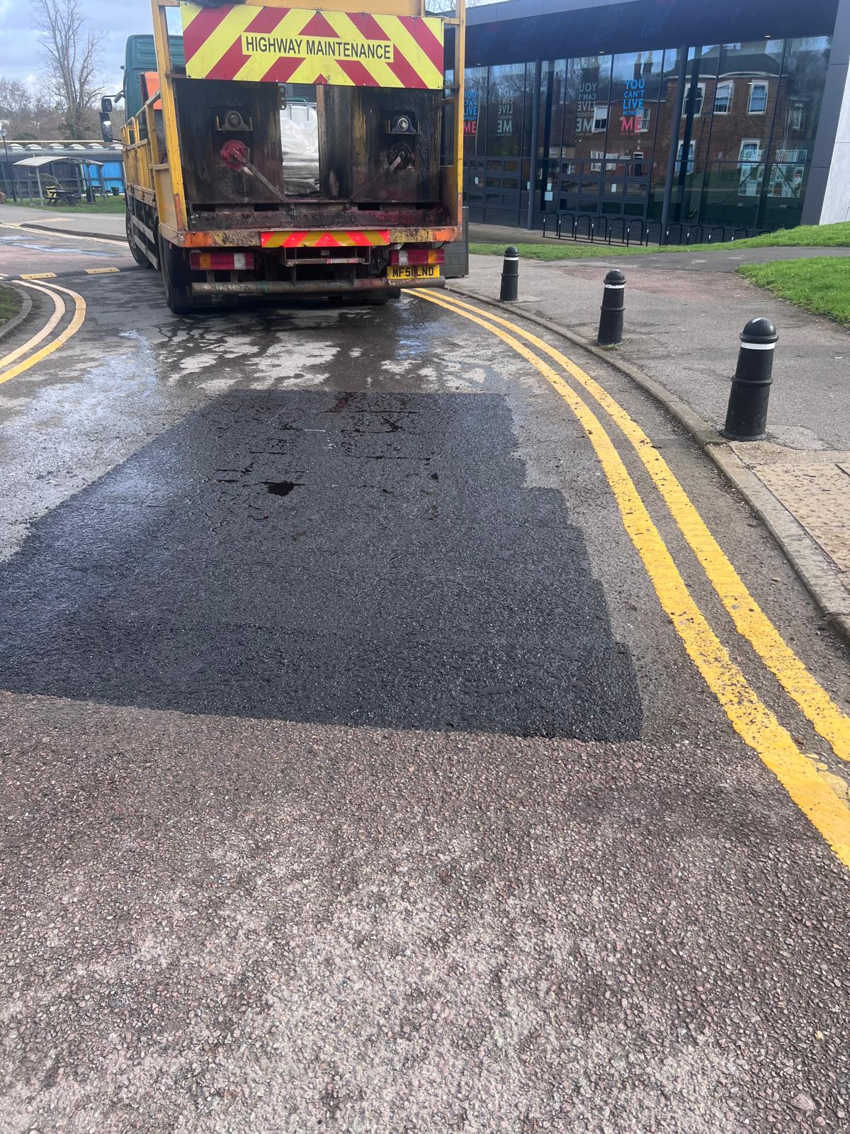 Professional road marking contractors working on Newport highway project