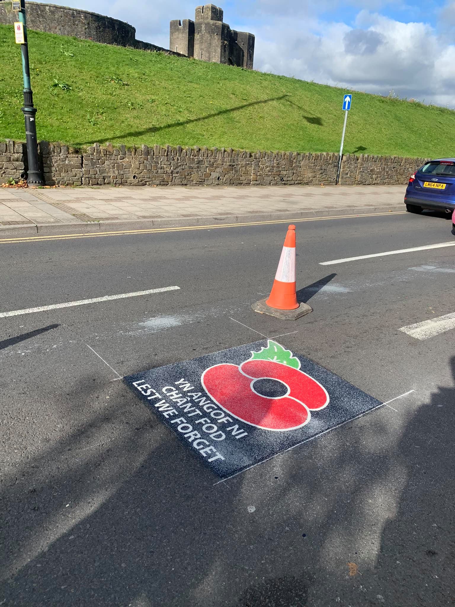 Coloured cycle lane surface coating being applied to improve cyclist safety
